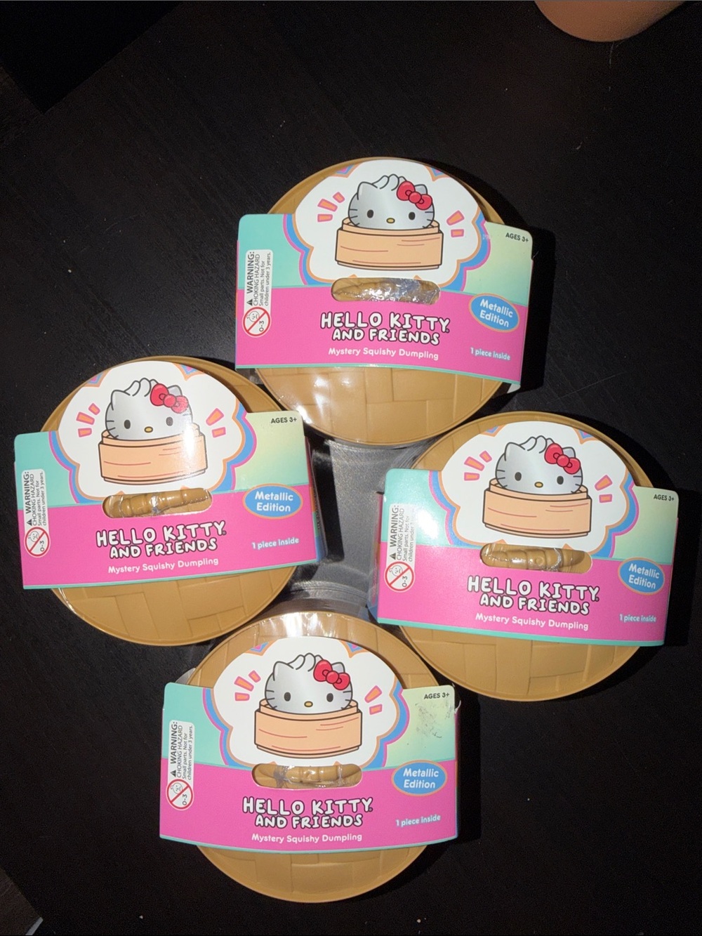 FOUR 4 Hello Kitty Metallic Edition Mystery Squishy Dumplings
